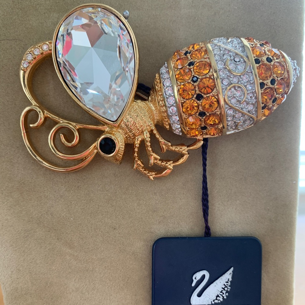 Swarovski brooch/ golden bee with Swarovski stones. stamped in the back. Vintage